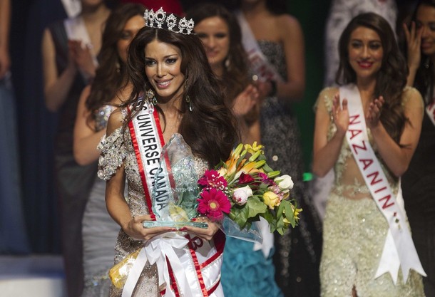 Contestant Sahar Biniaz celebrates as she wins the Miss Universe Canada competition in Toronto