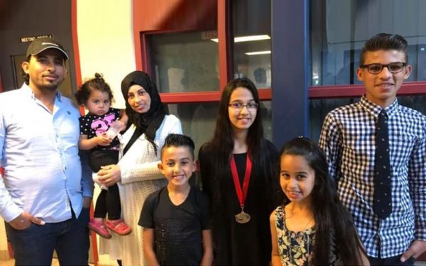 Five of the Barho children with their parents, in an undated photo posted to Facebook by the Halifax mosque the family attended. (Ummah Masjid/Facebook)