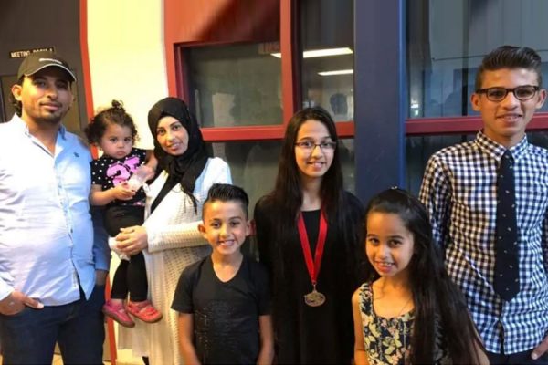 Five of the Barho children with their parents, in an undated photo posted to Facebook by the Halifax mosque the family attended. (Ummah Masjid/Facebook)